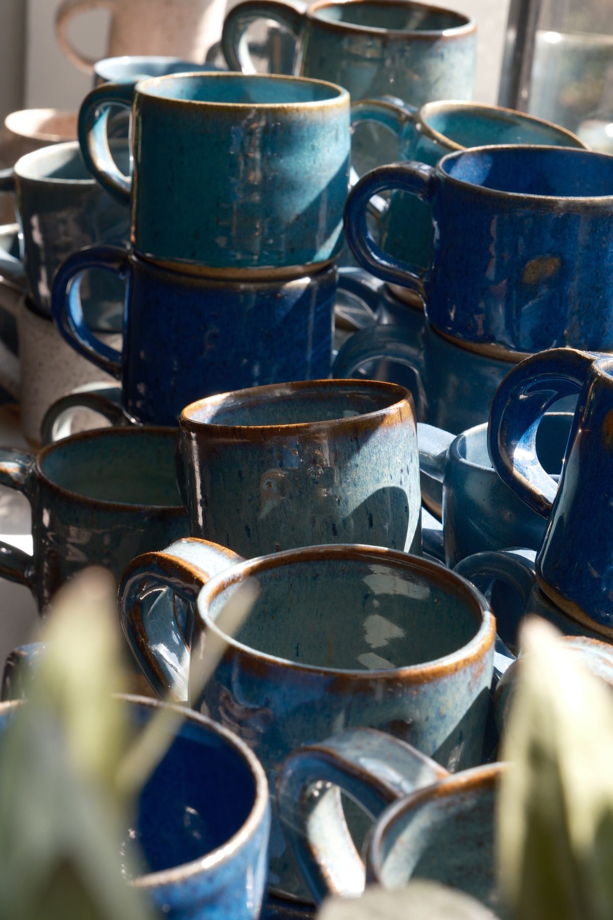 Grouped blue mugs